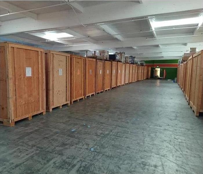 Wooden crates in second level of warehouse
