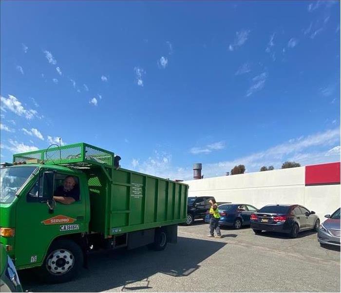SERVPRO dump truck in office parking lot